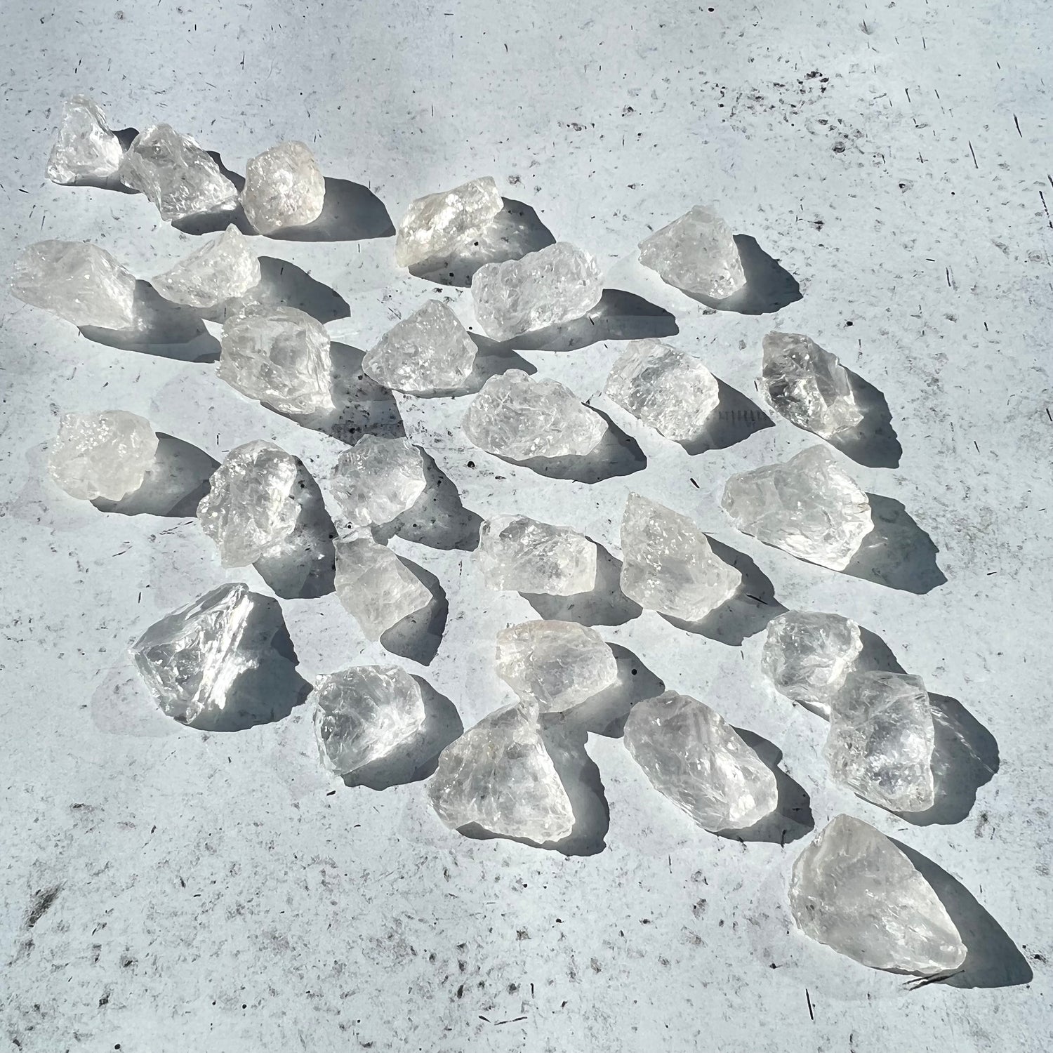 Arrangement of raw clear quartz chunks